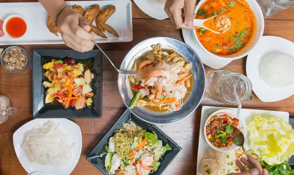 Table full of Thai food